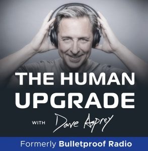 A man wearing headphones smiles at the camera. Text reads: "The Human Upgrade with Dave Asprey. Formerly Bulletproof Radio.