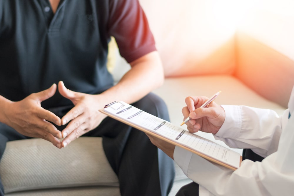 Male patient during a consultation with an urologist