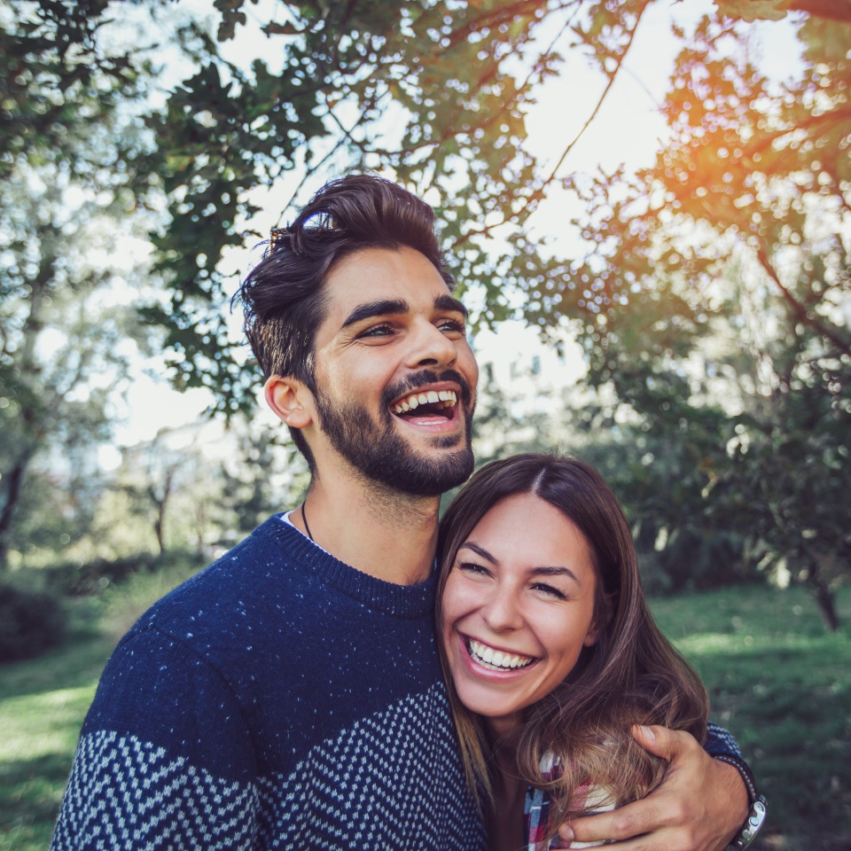 Young couple in love having fun and enjoying the beautiful nature